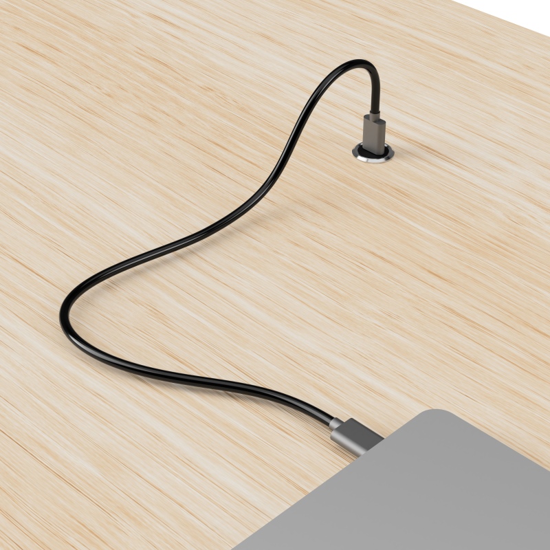 USB-C Ladebuchse in Schreibtisch mit angeschlossenem Notebook